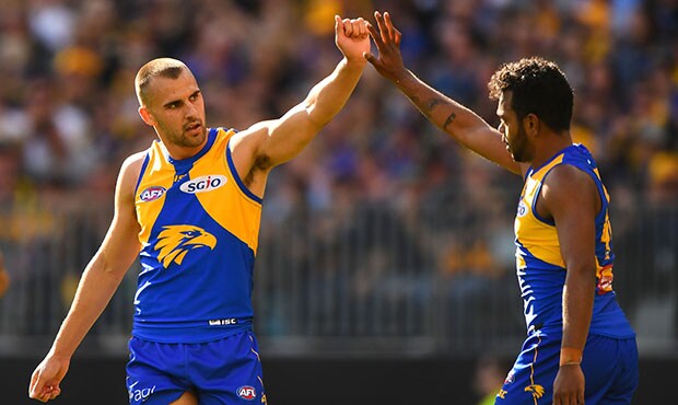 AFL 2018 Round 22 - West Coast v Melbourne PERTH, AUSTRALIA - AUGUST 19: Dom Sheed and Willie Rioli of the Eagles celebrates a goal during the 2018 AFL round 22 match between the West Coast Eagles and the Melbourne Demons at Optus Stadium on August 19, 2018 in Perth, Australia. (Photo by Daniel Carson/AFL Media)